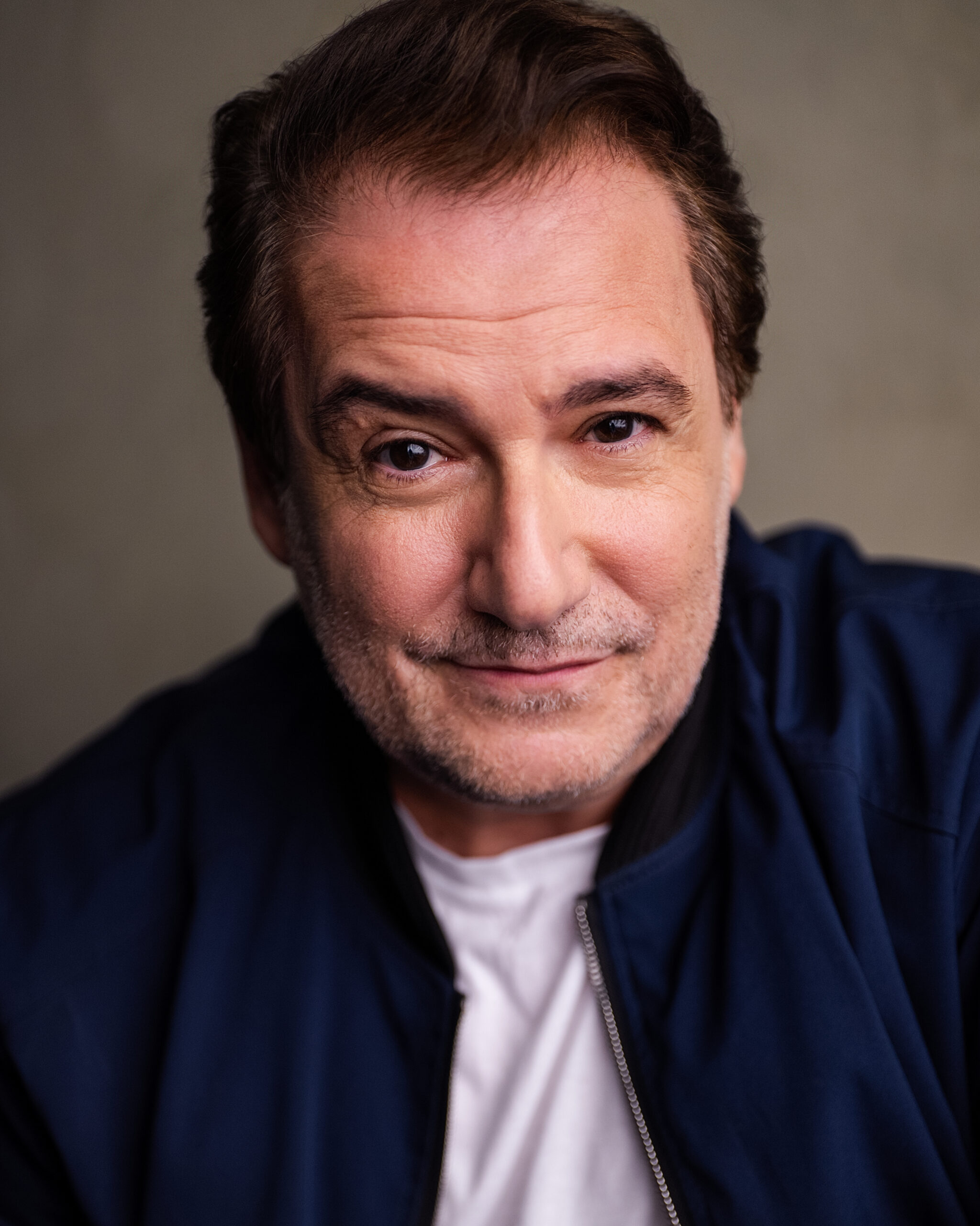 Carl De Gregorio in blue portrait